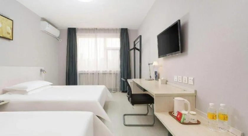 Bed in Jinjiang Inn Dalian Development Zone Jinma Road Light Railway Station