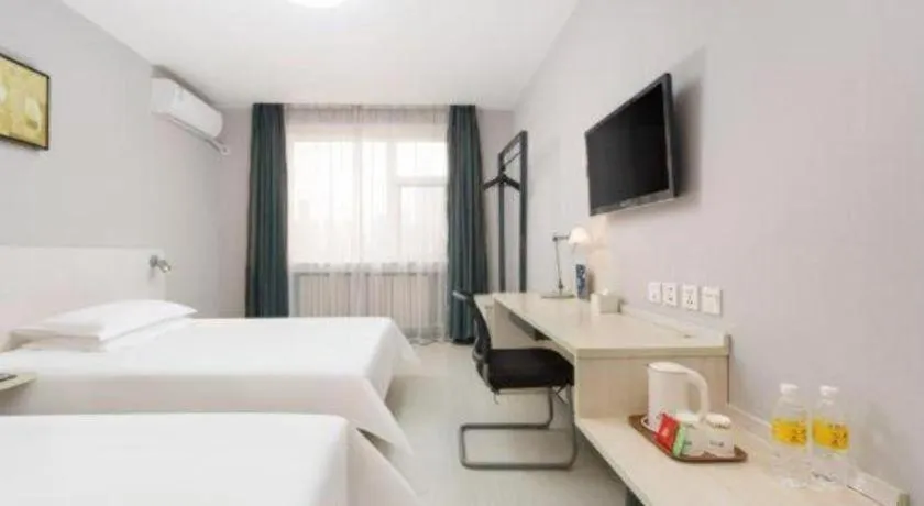 Bed in Jinjiang Inn Dalian Development Zone Jinma Road Light Railway Station