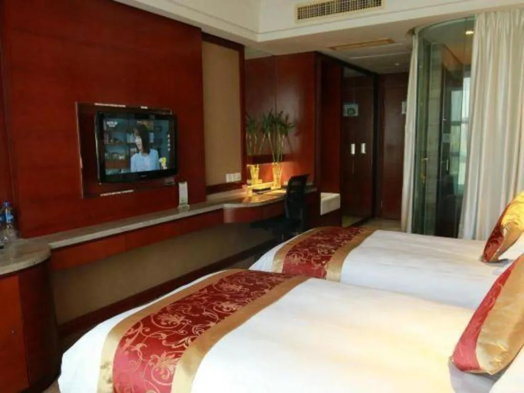 Bed in Maison New Century Hotel Wuyuan Haiyan