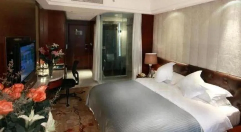 Bed in Maison New Century Hotel Wuyuan Haiyan