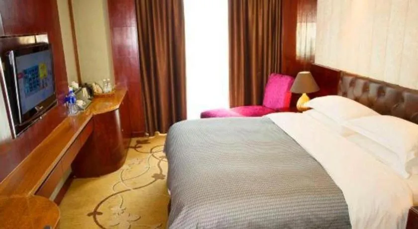 Bed in Maison New Century Hotel Wuyuan Haiyan