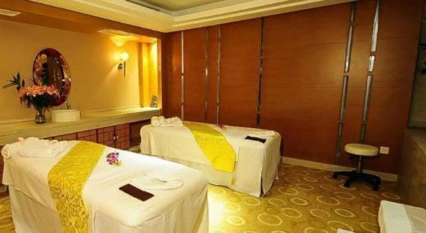 Bed in Maison New Century Hotel Wuyuan Haiyan