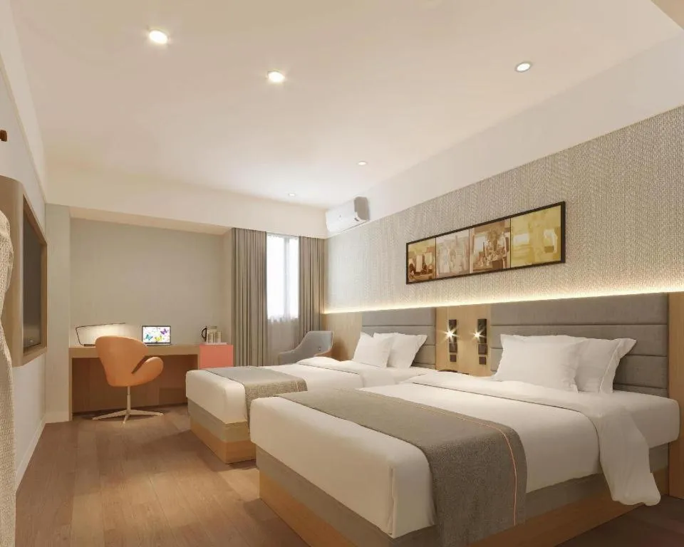 Bed in Jinjiang Inn Zhengzhou Railway Station Erqi Square Metro Station