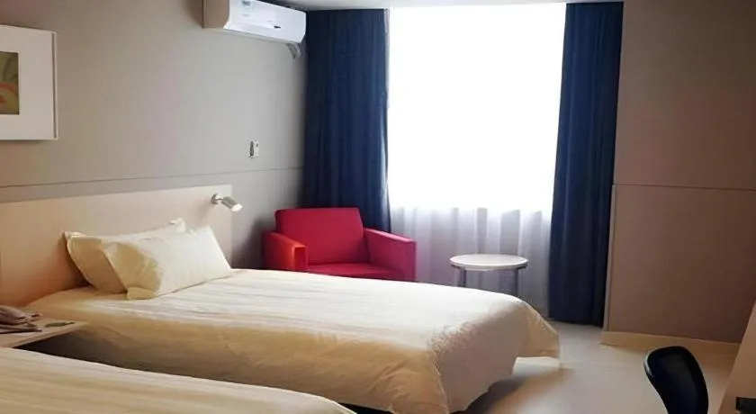 Bed in Jinjiang Inn Ningbo Airport Outlets Plaza
