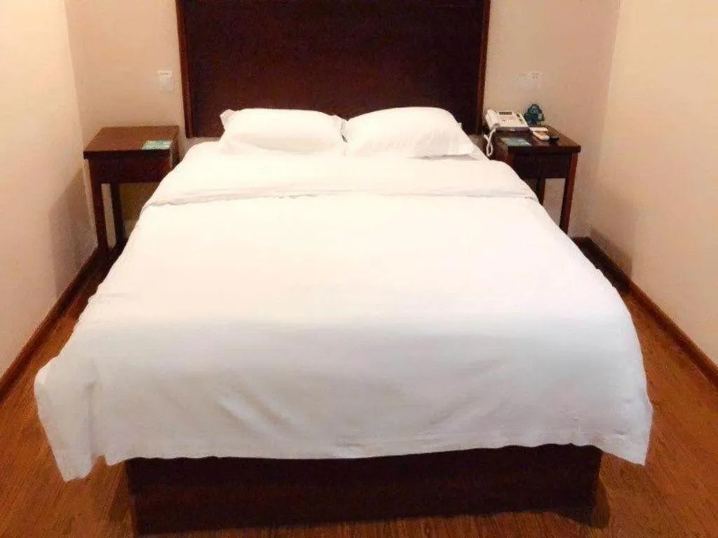 Bed in GreenTree Inn Huaian Lianshui Jindi International Garden Business Hotel