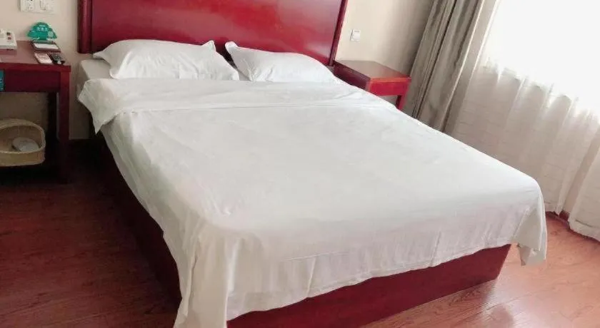 Bed in GreenTree Inn Huaian Lianshui Jindi International Garden Business Hotel