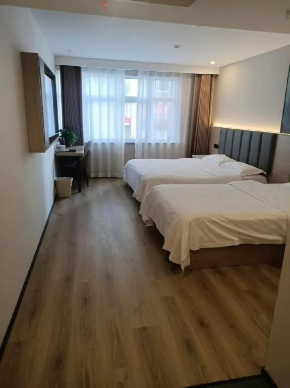 Bed in GreenTree Inn Huaian Lianshui Jindi International Garden Business Hotel