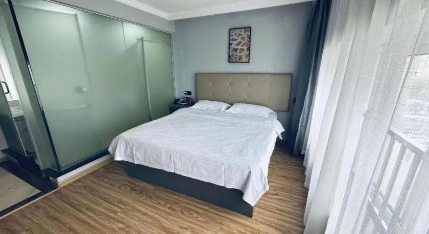 Bed in GreenTree Inn Huaian Lianshui Jindi International Garden Business Hotel