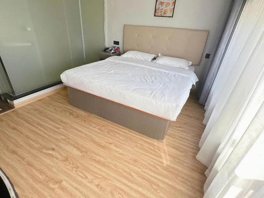 Bed in GreenTree Inn Huaian Lianshui Jindi International Garden Business Hotel