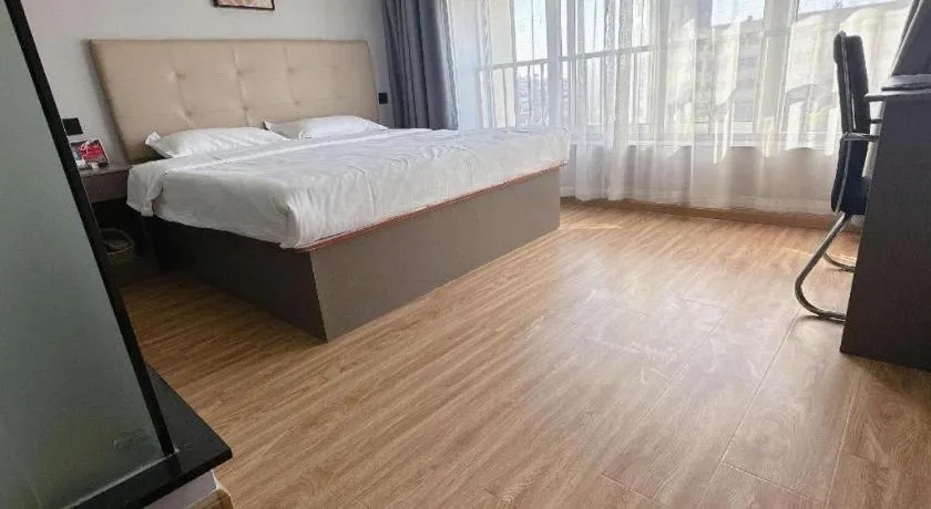 Bed in GreenTree Inn Huaian Lianshui Jindi International Garden Business Hotel