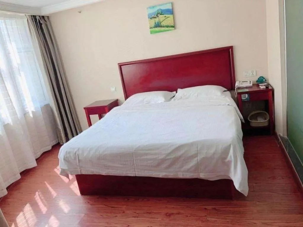 Bed in GreenTree Inn Huaian Lianshui Jindi International Garden Business Hotel
