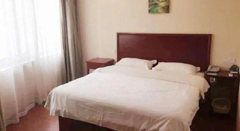 Bed in GreenTree Inn Huaian Lianshui Jindi International Garden Business Hotel