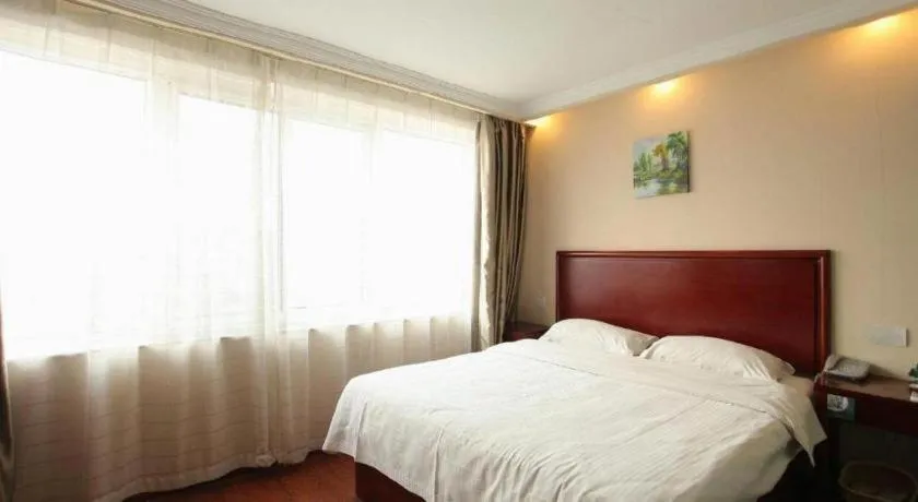 Bed in GreenTree Inn Huaian Lianshui Jindi International Garden Business Hotel