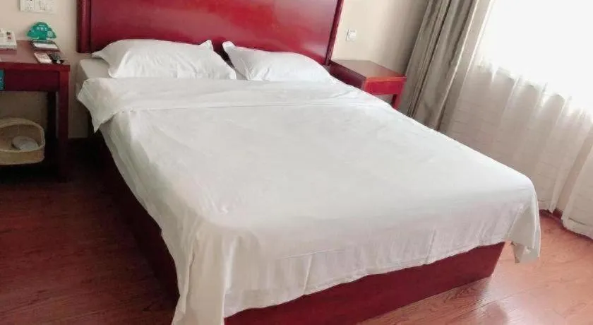 Bed in GreenTree Inn Huaian Lianshui Jindi International Garden Business Hotel