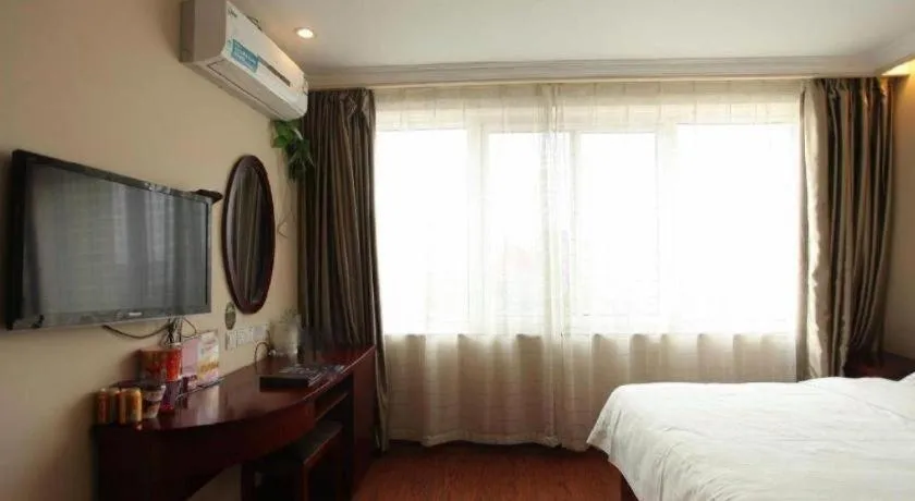 Bed in GreenTree Inn Huaian Lianshui Jindi International Garden Business Hotel