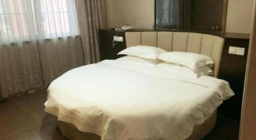 Bed in GreenTree Inn Huaian Lianshui Jindi International Garden Business Hotel