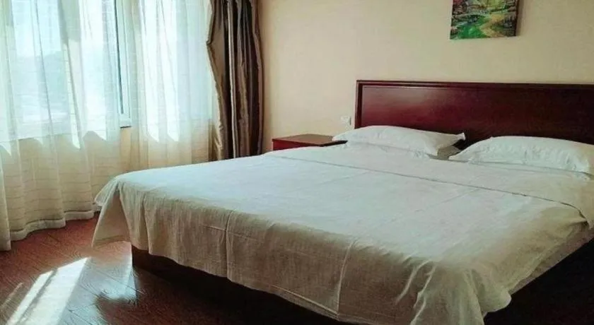 Bed in GreenTree Inn Huaian Lianshui Jindi International Garden Business Hotel