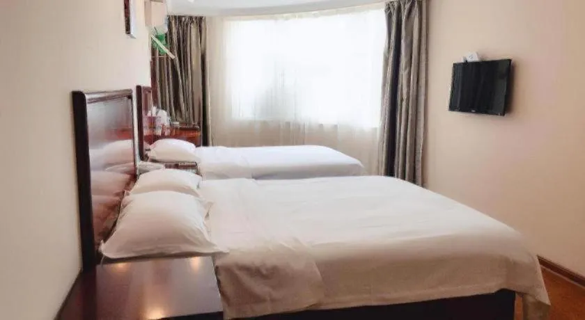 Bed in GreenTree Inn Huaian Lianshui Jindi International Garden Business Hotel