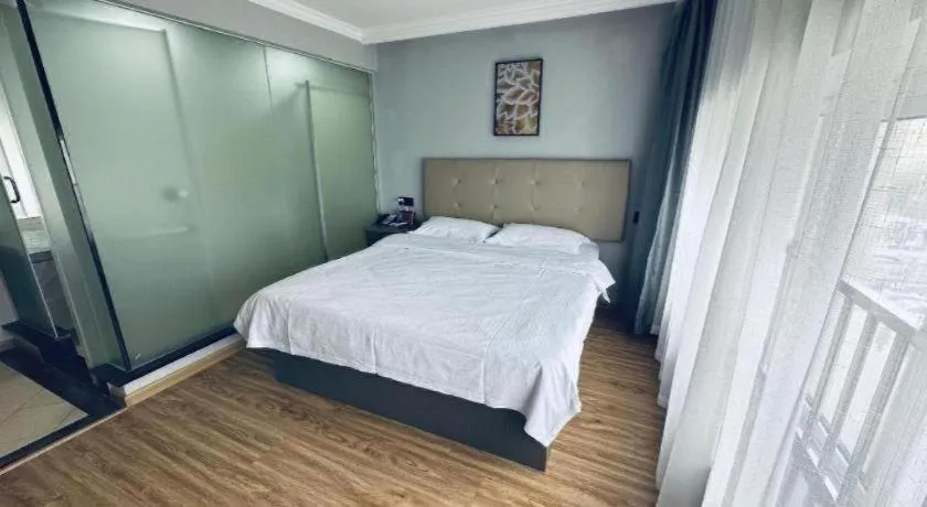 Bed in GreenTree Inn Huaian Lianshui Jindi International Garden Business Hotel