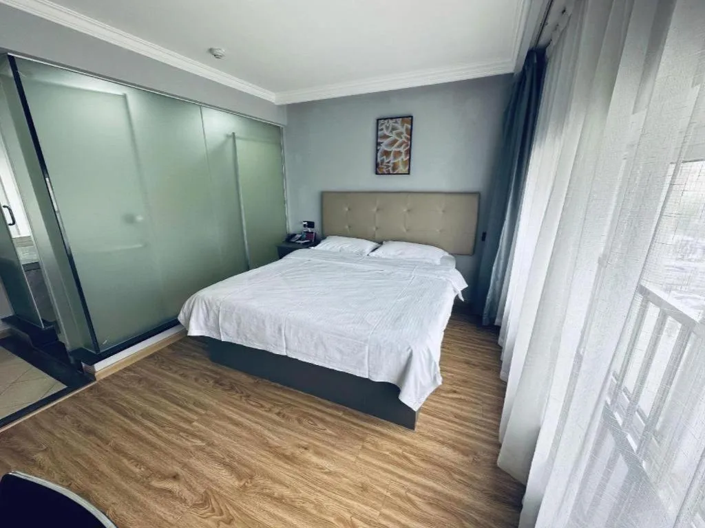 Bed in GreenTree Inn Huaian Lianshui Jindi International Garden Business Hotel