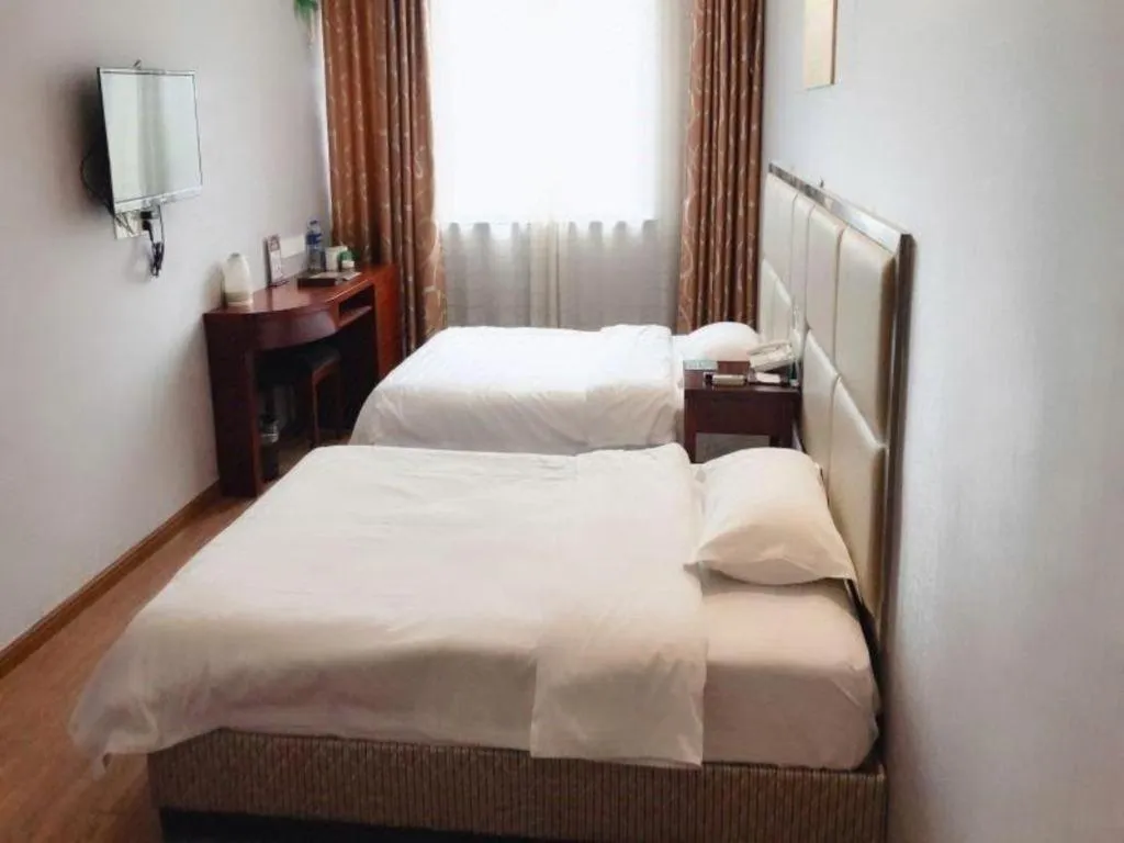 Bed in GreenTree Inn Huaian Lianshui Jindi International Garden Business Hotel