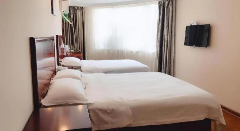 Bed in GreenTree Inn Huaian Lianshui Jindi International Garden Business Hotel