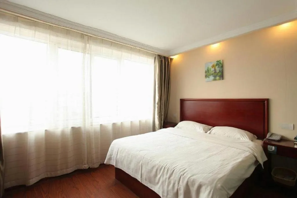 Bed in GreenTree Inn Huaian Lianshui Jindi International Garden Business Hotel