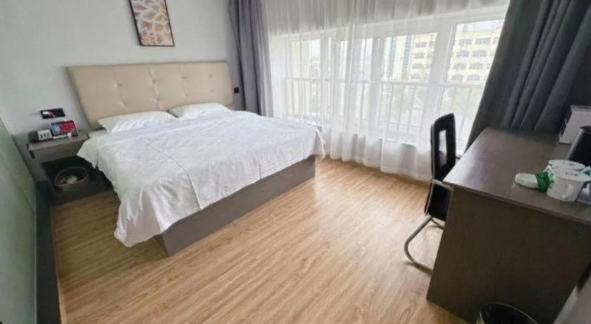 Bed in GreenTree Inn Huaian Lianshui Jindi International Garden Business Hotel