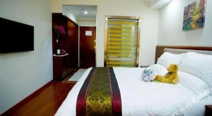 Bed in GreenTree Inn Shanghai South Railway Station Xujiahui Stadium Subway Station Shell Hotel