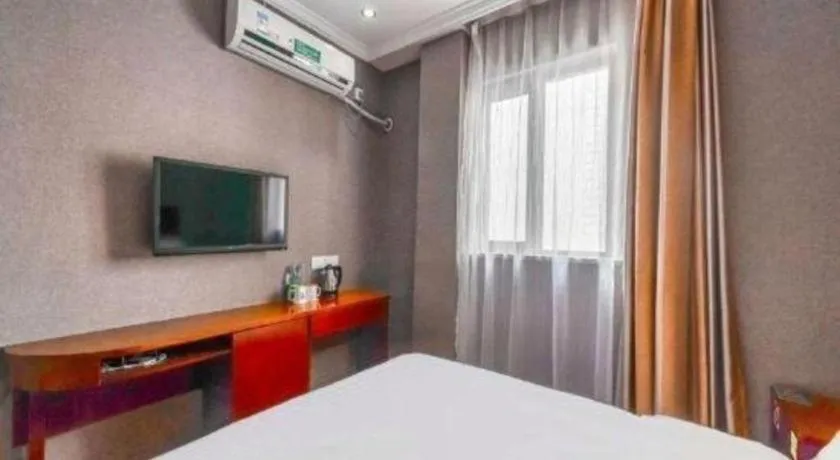 Bed in GreenTree Inn Shanghai South Railway Station Xujiahui Stadium Subway Station Shell Hotel