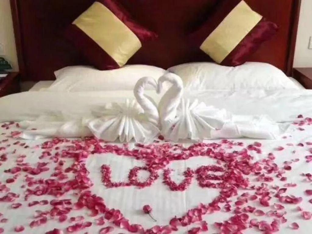 Bed in GreenTree Inn Shanghai South Railway Station Xujiahui Stadium Subway Station Shell Hotel