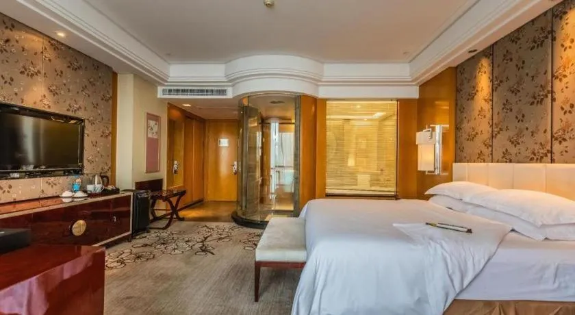 Bed in Zhangjiagang Zhonglian GDH International Hotel