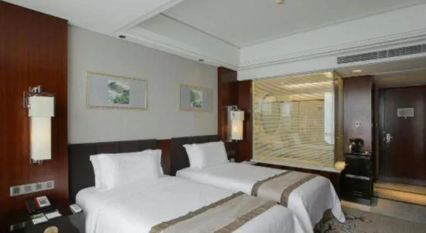 Bed in Zhangjiagang Zhonglian GDH International Hotel