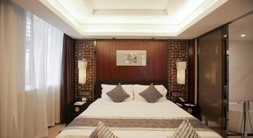 Bed in Zhangjiagang Zhonglian GDH International Hotel