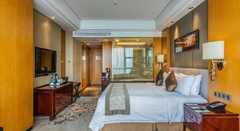 Bed in Zhangjiagang Zhonglian GDH International Hotel