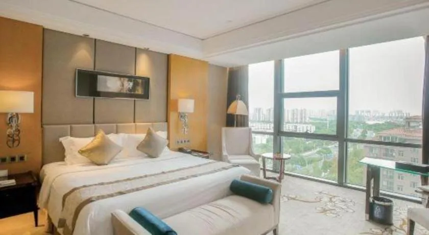 Bed in Zhangjiagang Zhonglian GDH International Hotel