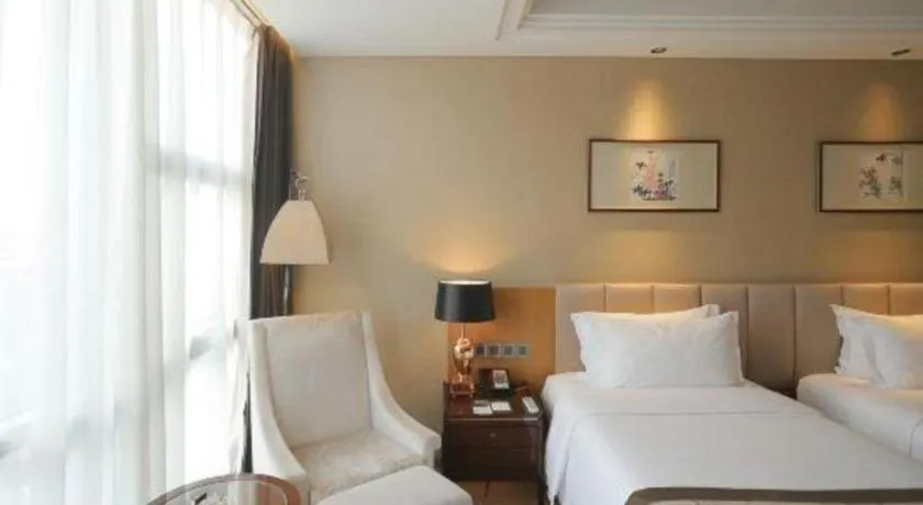 Bed in Zhangjiagang Zhonglian GDH International Hotel