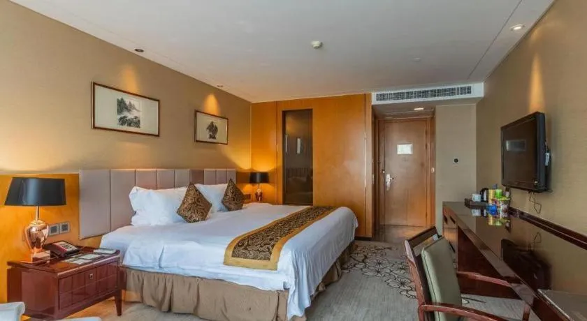 Bed in Zhangjiagang Zhonglian GDH International Hotel