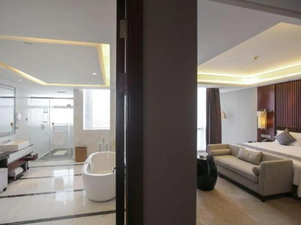 Bed in Zhangjiagang Zhonglian GDH International Hotel