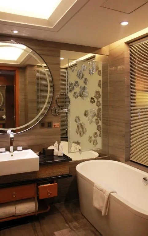 Bed in Zhangjiagang Zhonglian GDH International Hotel