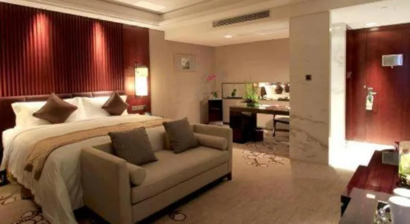 Bed in Zhangjiagang Zhonglian GDH International Hotel