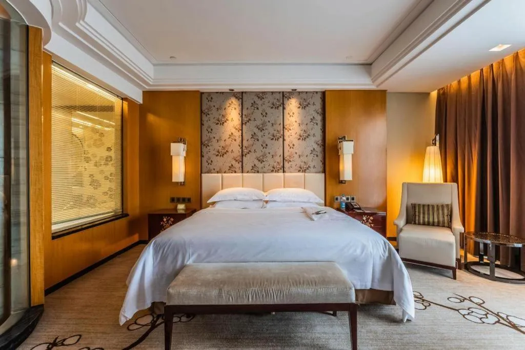 Bed in Zhangjiagang Zhonglian GDH International Hotel