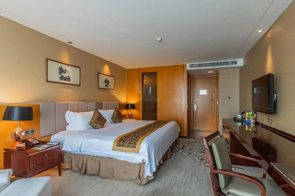 Bed in Zhangjiagang Zhonglian GDH International Hotel