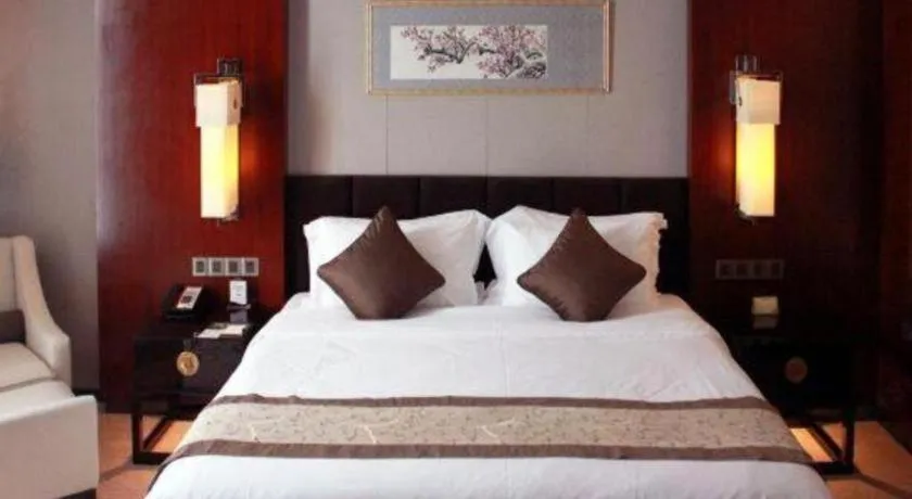 Bed in Zhangjiagang Zhonglian GDH International Hotel