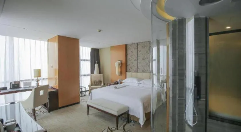 Bed in Zhangjiagang Zhonglian GDH International Hotel