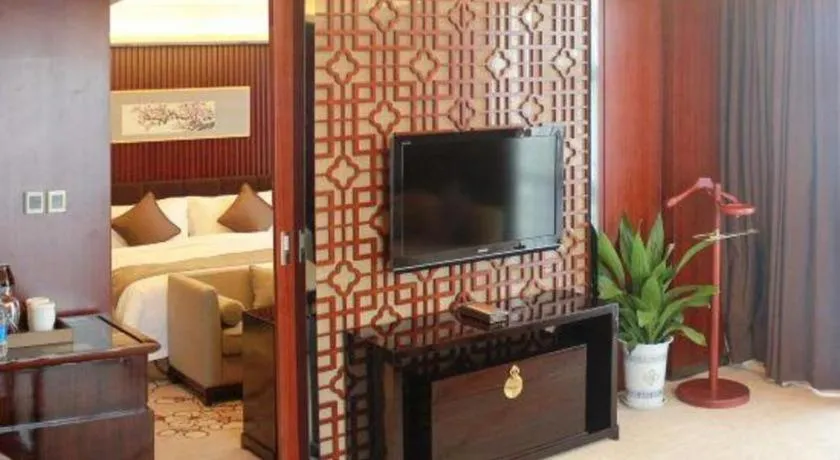 Bed in Zhangjiagang Zhonglian GDH International Hotel