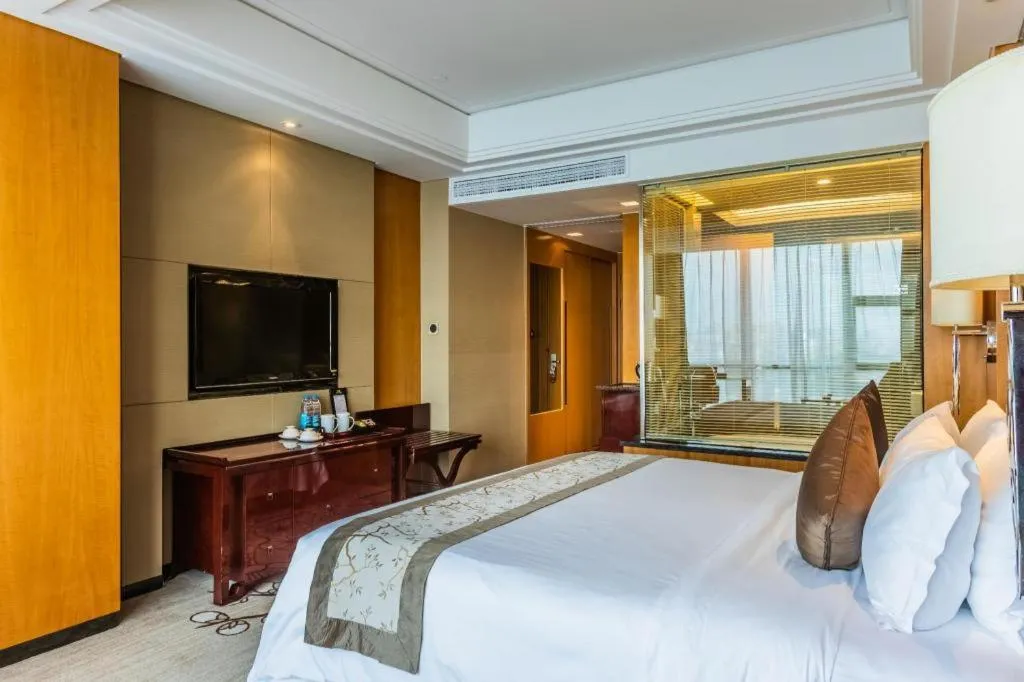 Bed in Zhangjiagang Zhonglian GDH International Hotel