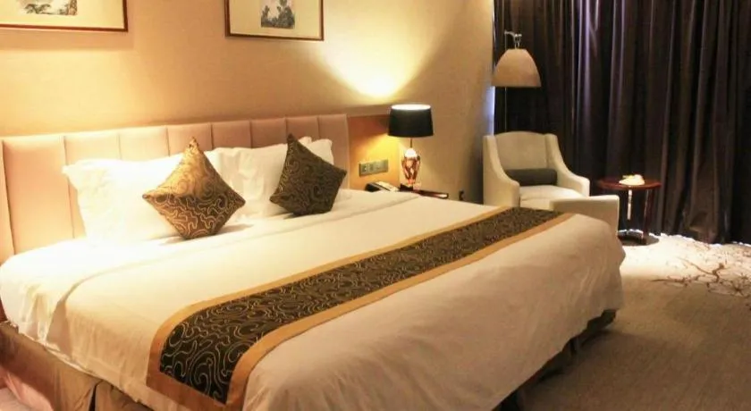 Bed in Zhangjiagang Zhonglian GDH International Hotel