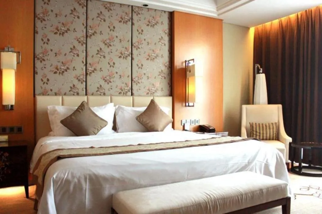 Bed in Zhangjiagang Zhonglian GDH International Hotel