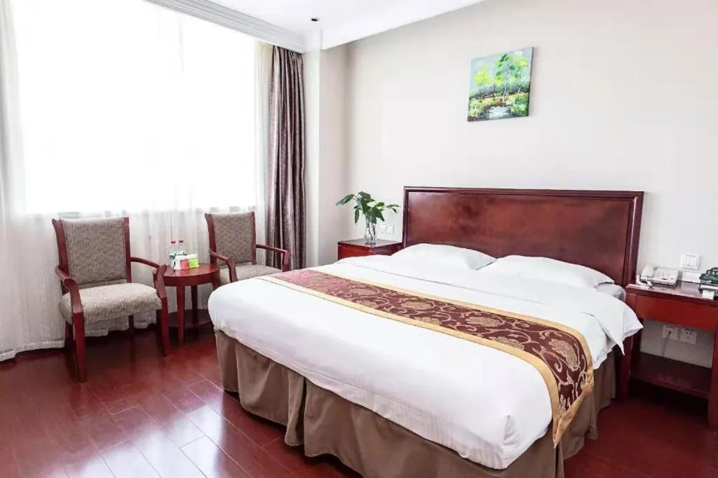 Bed in GreenTree Inn Shanghai Changxing Island Yuansha Fishing Port Hotel